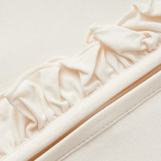 Salt Luxe Solid Ruffle Footed Romper