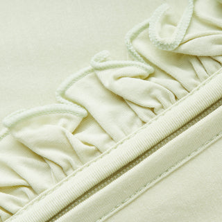 Aloe Luxe Solid Ruffle Footed Romper