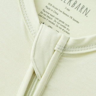 Aloe Luxe Solid Zipper Footed Romper